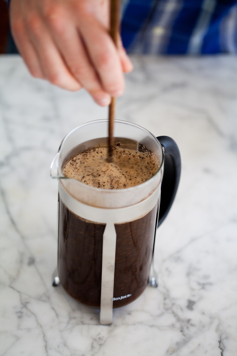 French press stirring coffee