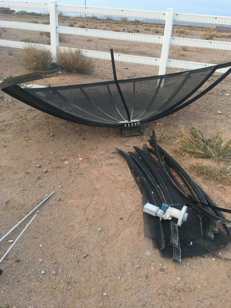 image of dish on groud in backyard