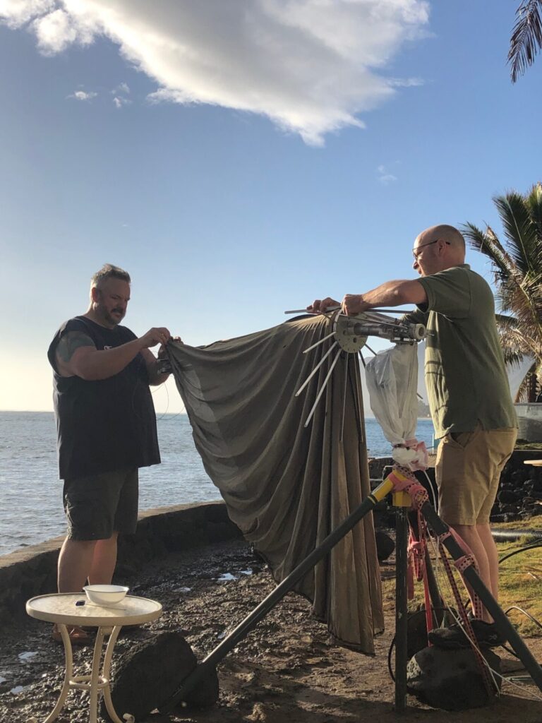 Paul and Jay putting the fabric back on.